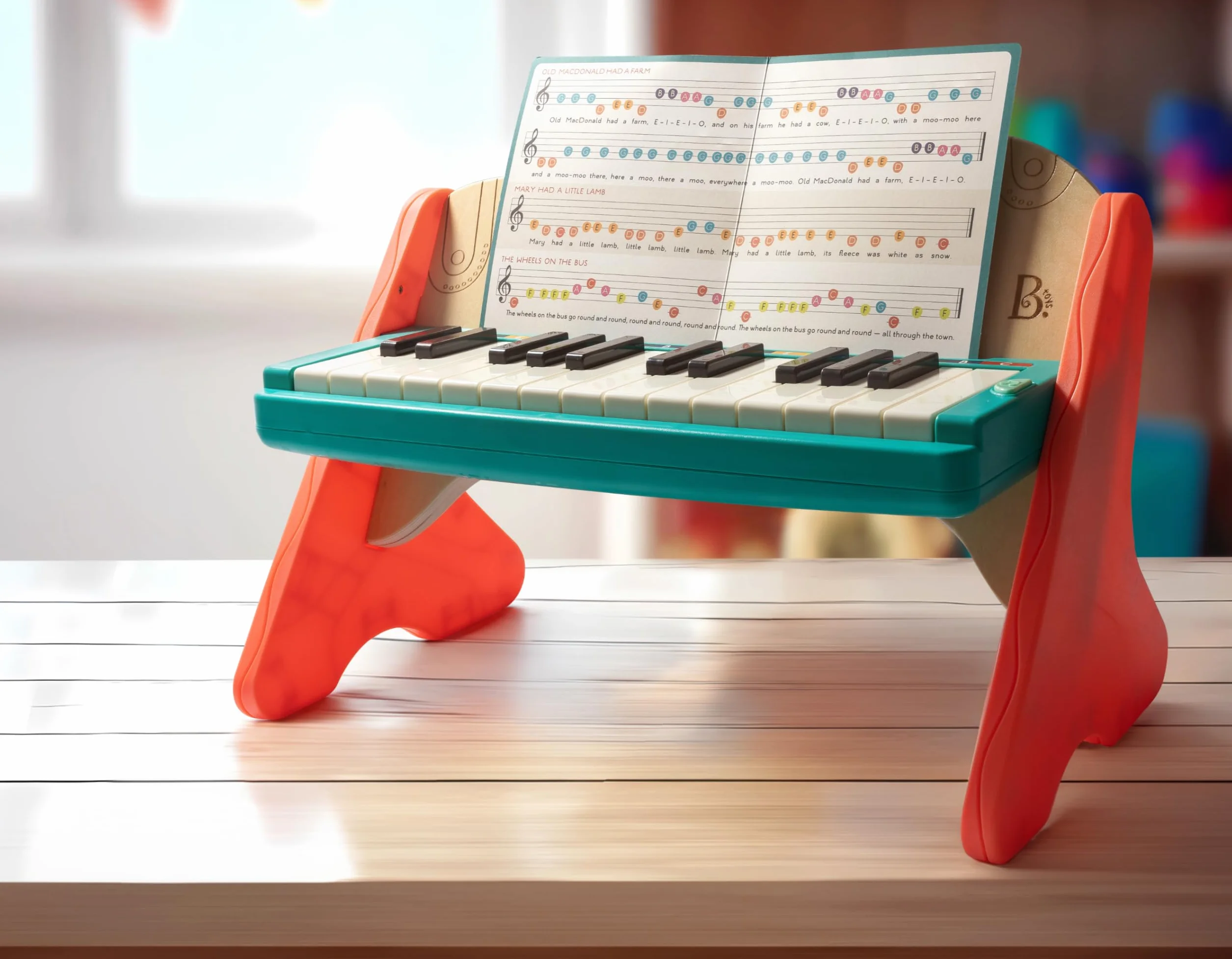 B. toys Jouet en Bois Mini Maestro avec Touches colorées, Plan, Lot de 1 | Livret de 6 compositions classiques inclus pour l’éveil musical et la créativité, Plan, Lot de 1, 3 ans et +